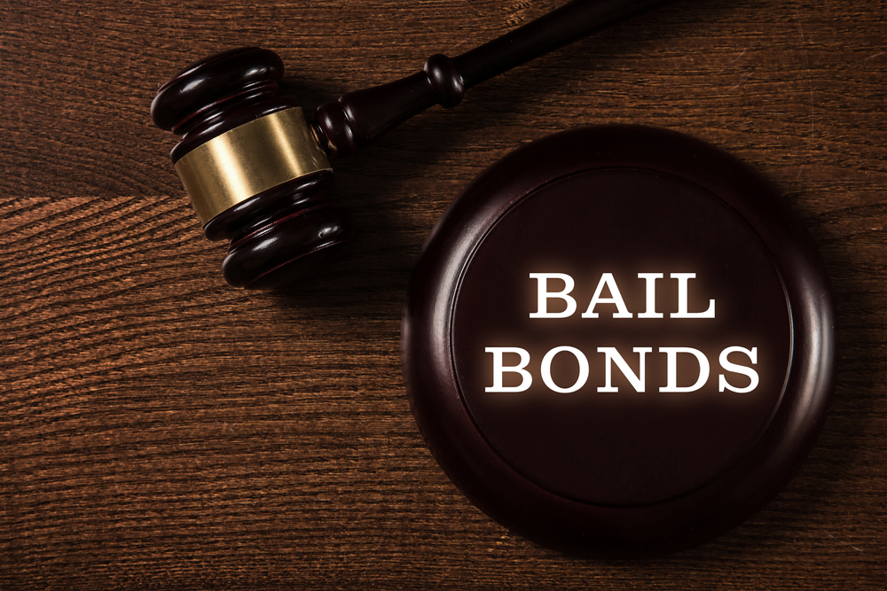 Bail,bonds,services,concept.,judge,gavel,on,wooden,background.