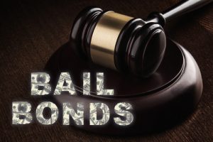Bail,bonds,services,concept.,judge,gavel,on,wooden,background.