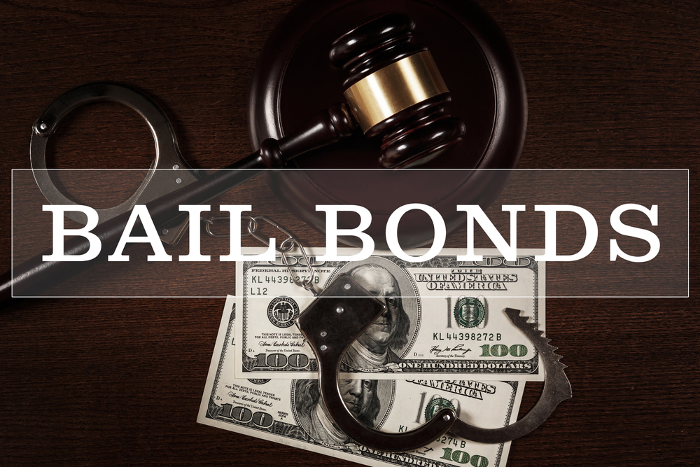 Bail,bonds,services,concept.,judge,gavel,,handcuffs,and,money,on