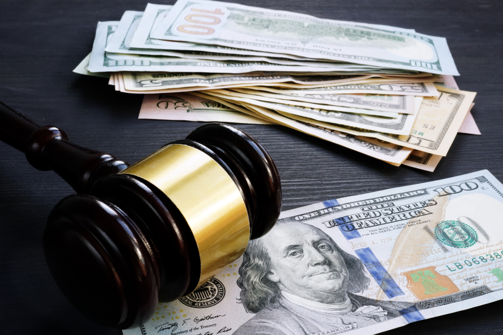 Bail,bond,and,financial,penalty.,gavel,and,money.